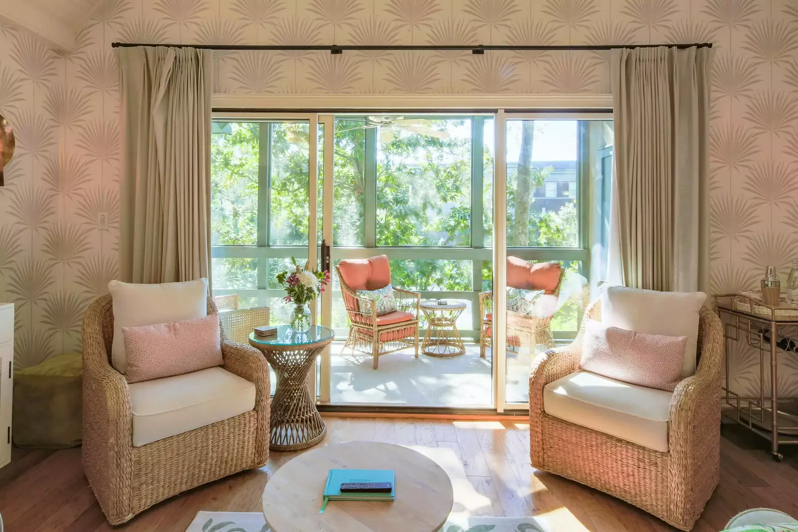 This room receives lovely natural light through the sliding glass doors to the screened porch.
