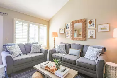 Creek Watch is a two story townhome with the living room, kitchen & dining area on the top floor.