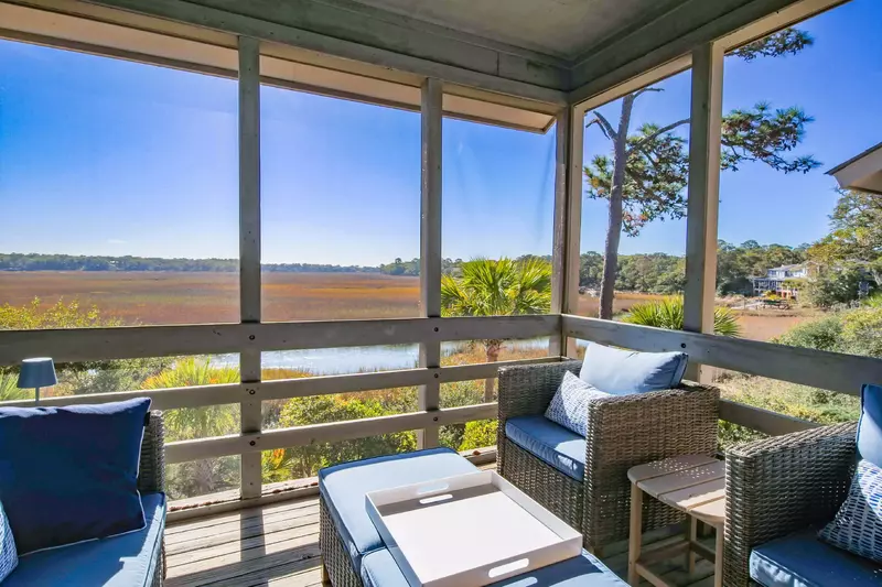 Step on out to the screened porch to enjoy gorgeous marsh views.