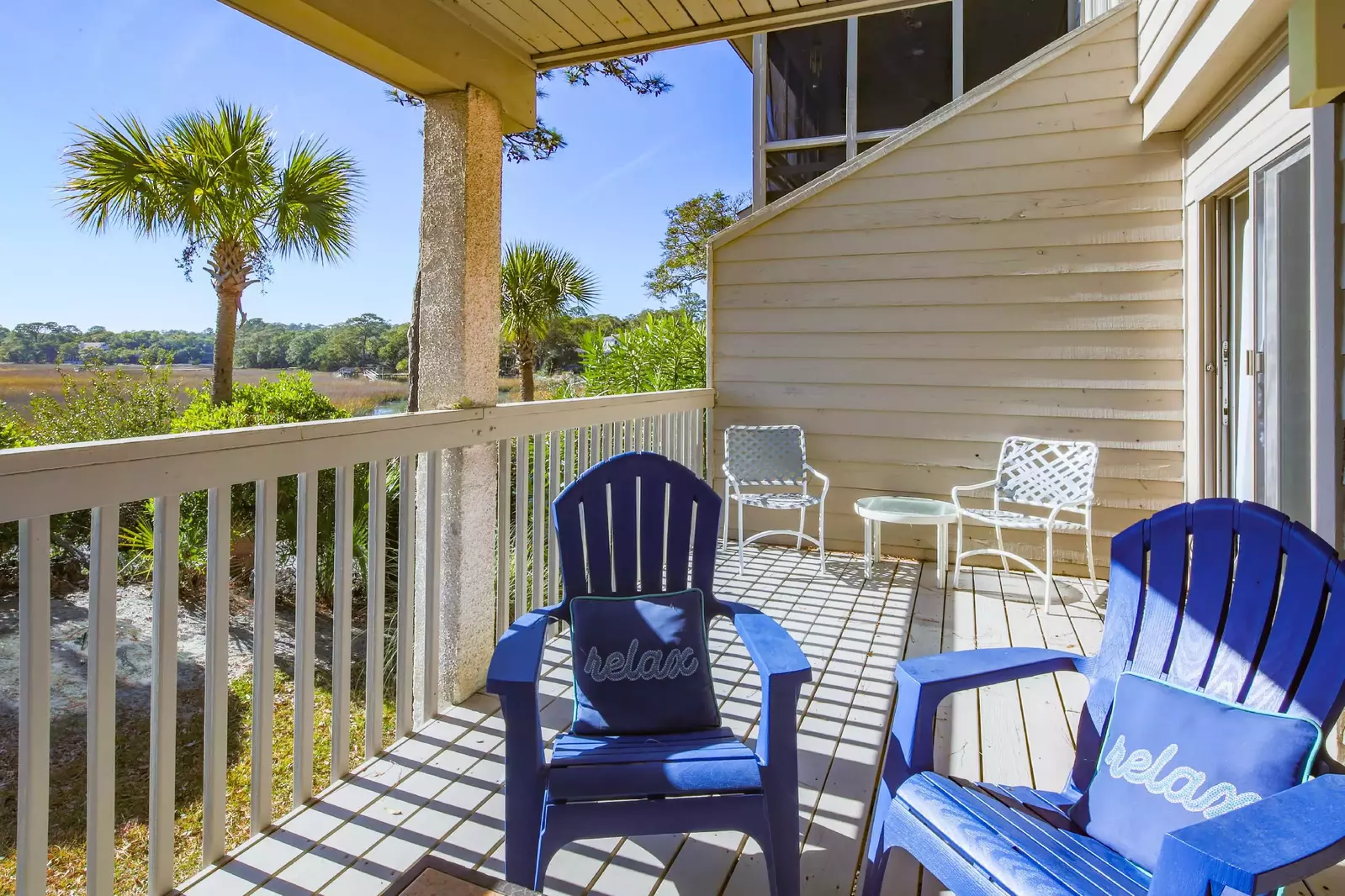 Grab a seat, soak up some sunshine and enjoy the marsh views on this private back deck.