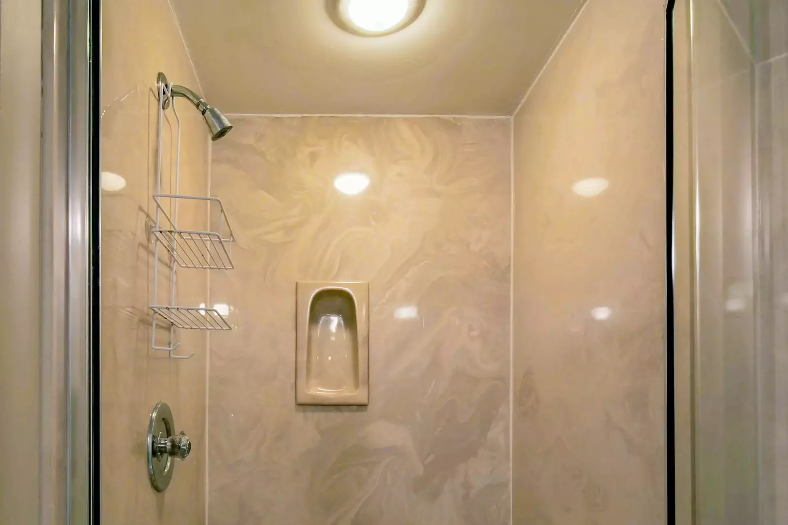 The en suite bathroom also has a walk-in shower.