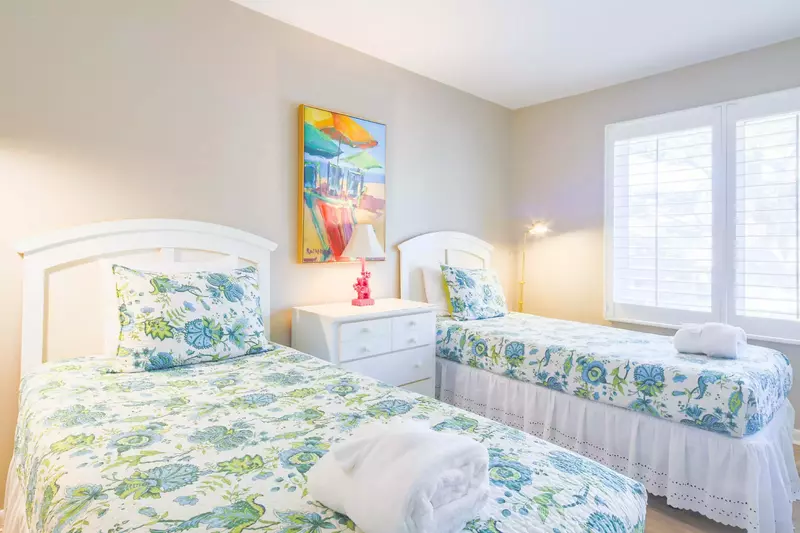 The guest suite is located on the home's lower level and looks out of the front side of the home.