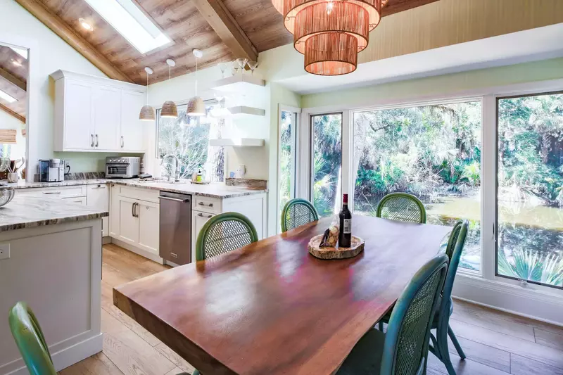 Enjoy views of the lagoon behind Nature's Haven from the large windows in the eat-in kitchen.