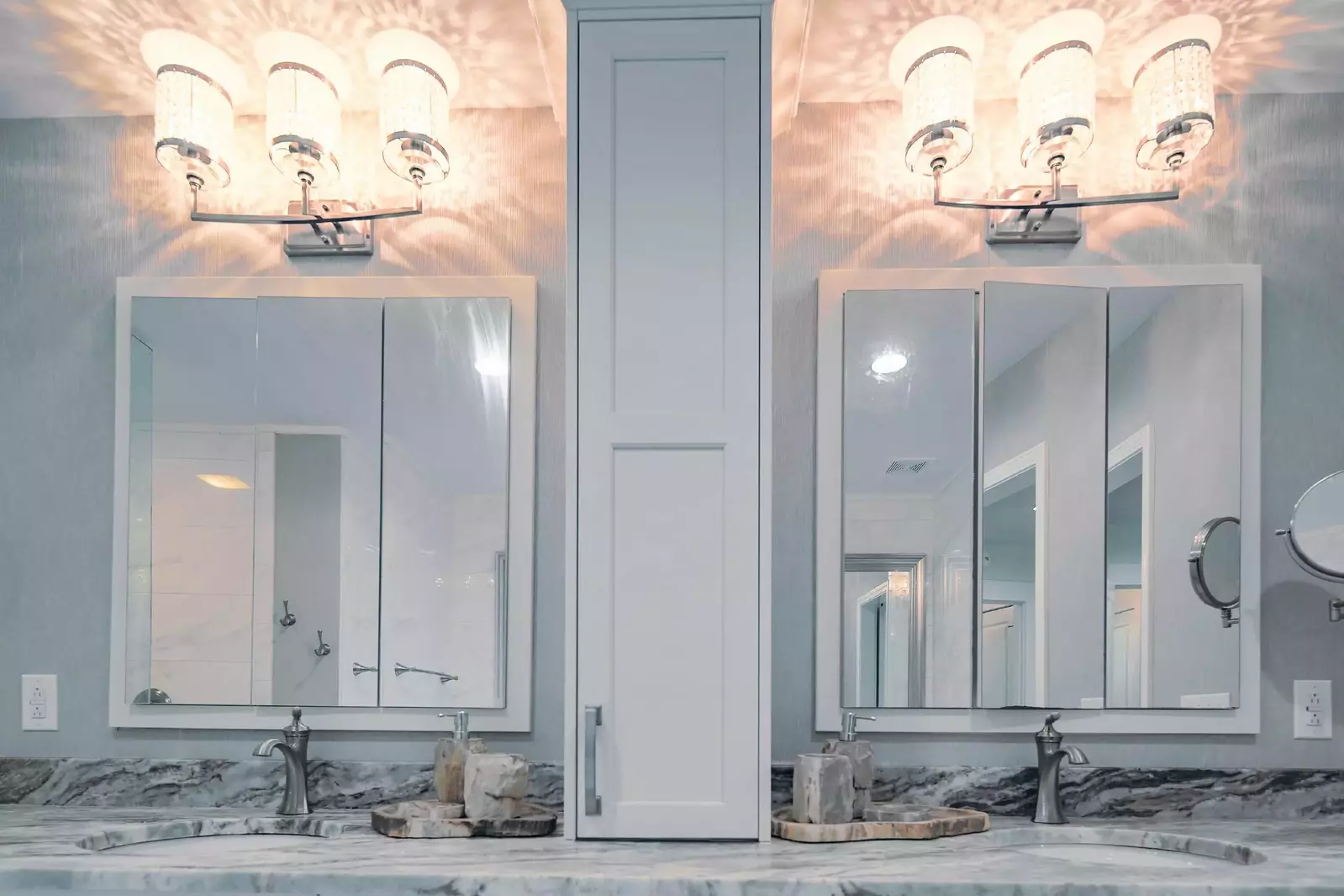 The en suite bathroom features a dual sink vanity.