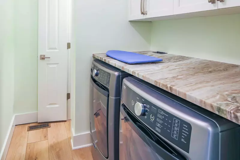 There is a full-sized washing machine and dryer in the home.