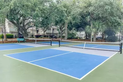 Guests of Happy Place may also access the Fairway Dunes pickle ball courts, tennis court and basketball court.