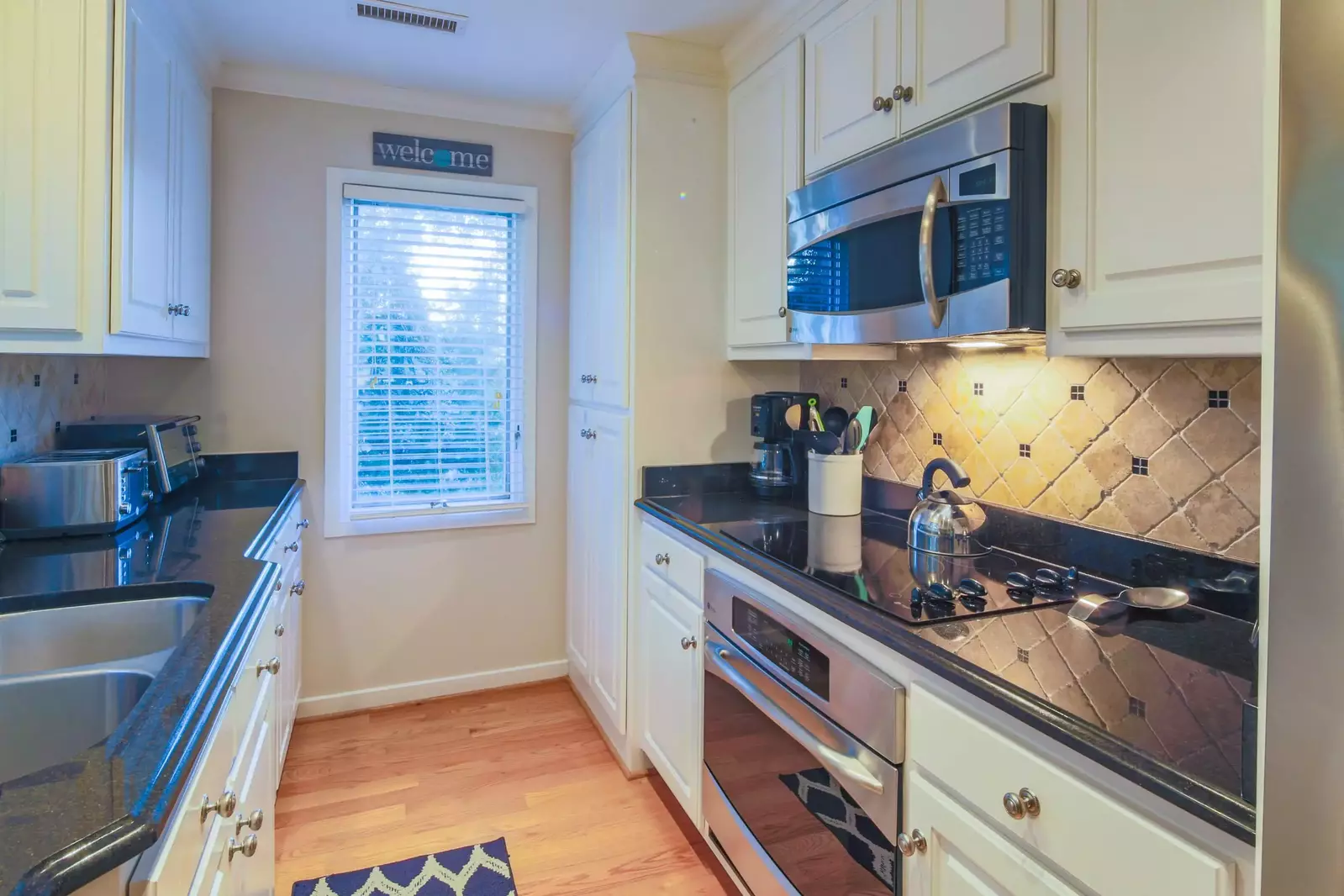 There's plenty of room in the renovated kitchen to prepare your family's meals.