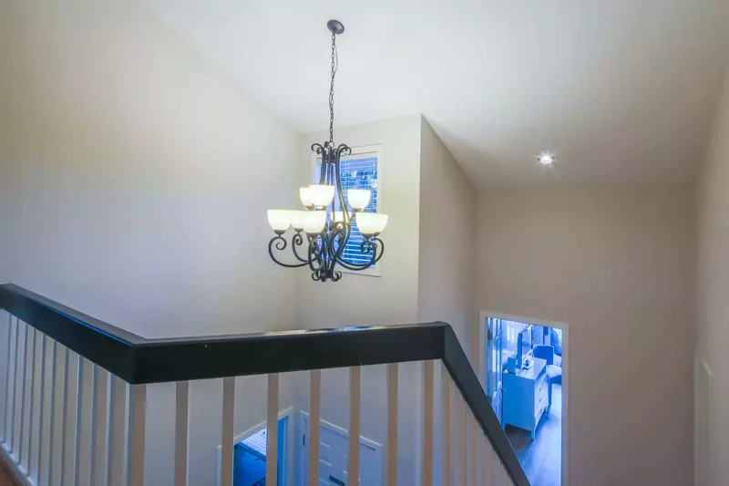 This staircase separates the lower bedroom level of the home from the upper level of the home.