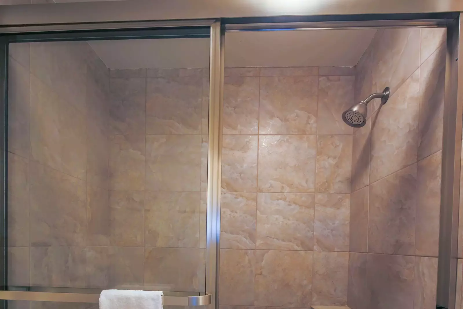 There is also a tiled shower/tub combo in this bathroom.