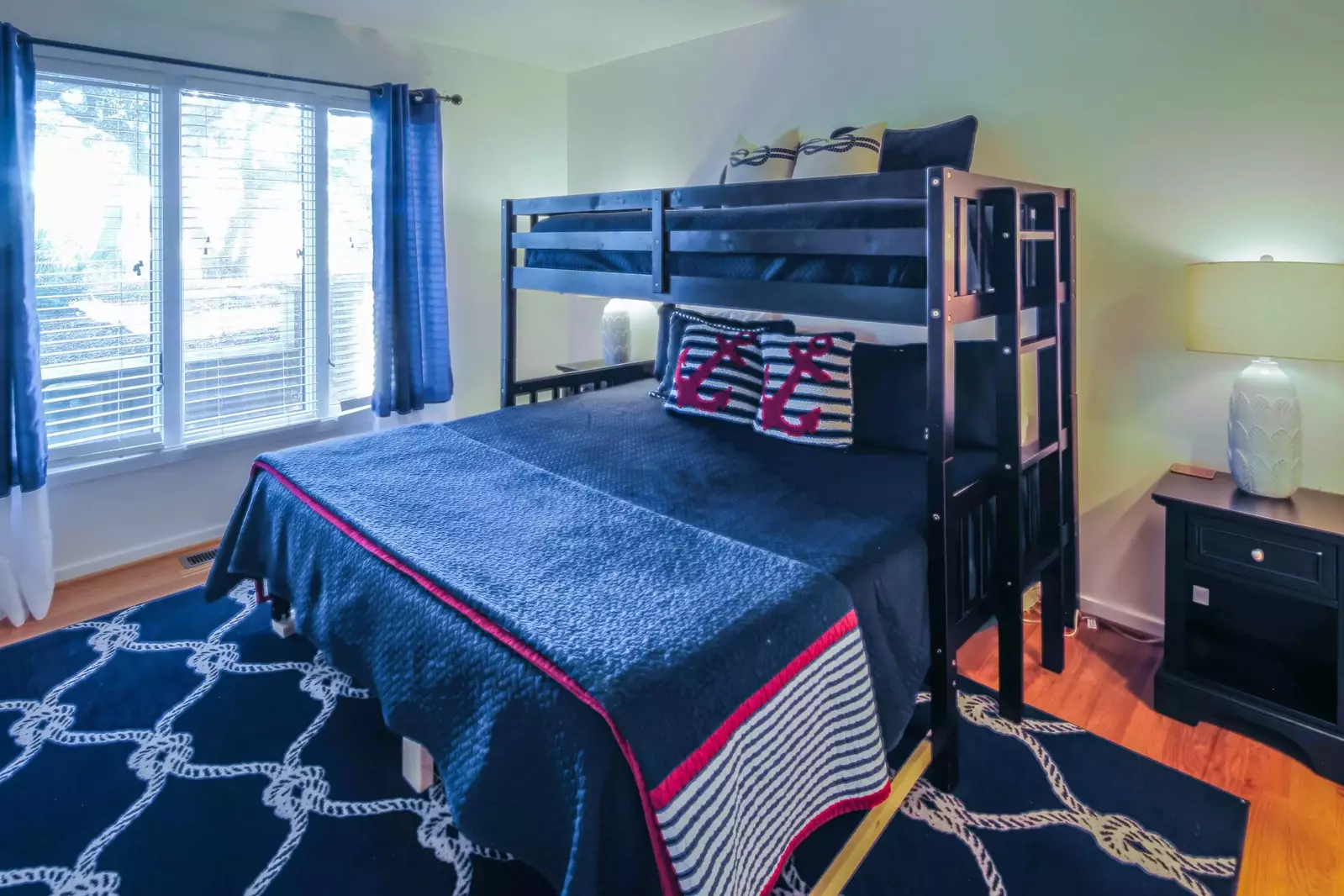 This guest suite also features two night stands with reading lamps.