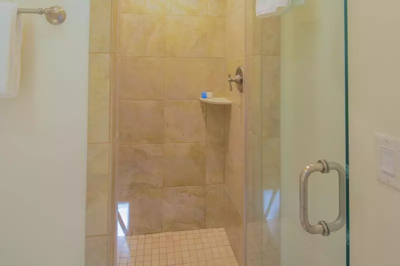 There is also a tiled, walk-in shower.