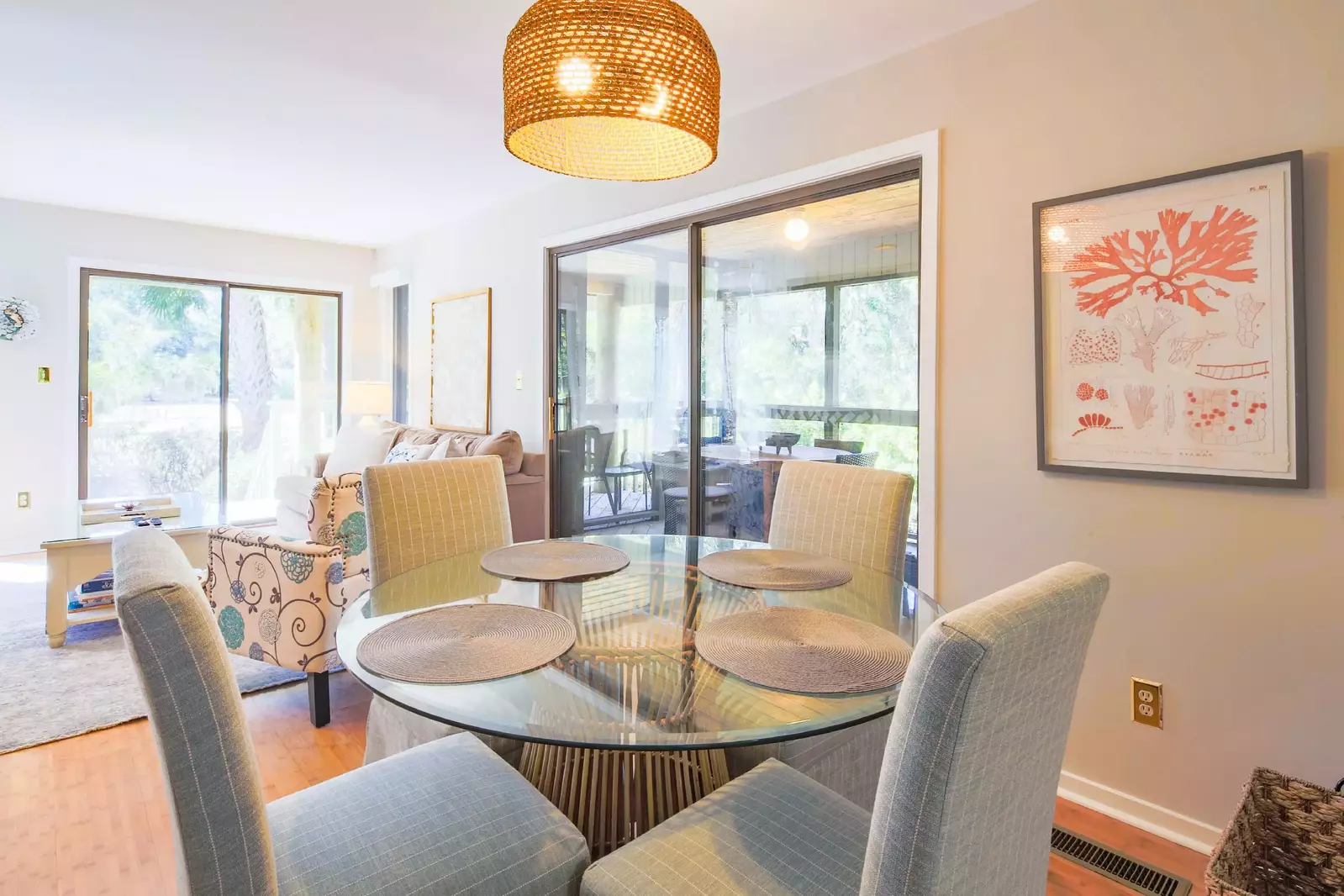 The dining table seats 4.  There is an additional dining table on the screened porch.