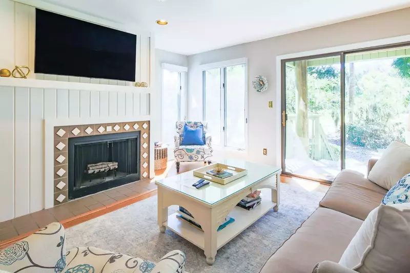 The Parkside living room features a comfortable seating area, a streaming TV and access to the porch.