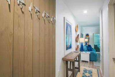 When you enter the home, you'll find this hallway that connects you to the bedroom, living room and kitchen.