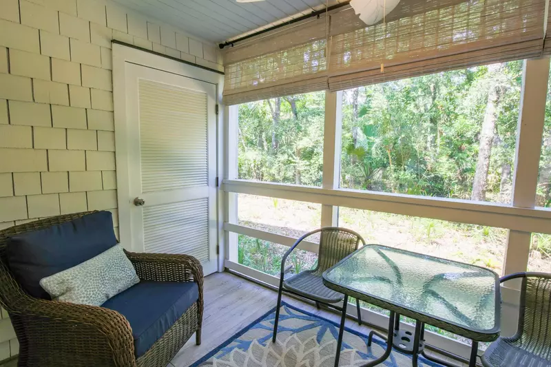 You'll find a half bathroom through this door on the screened porch.