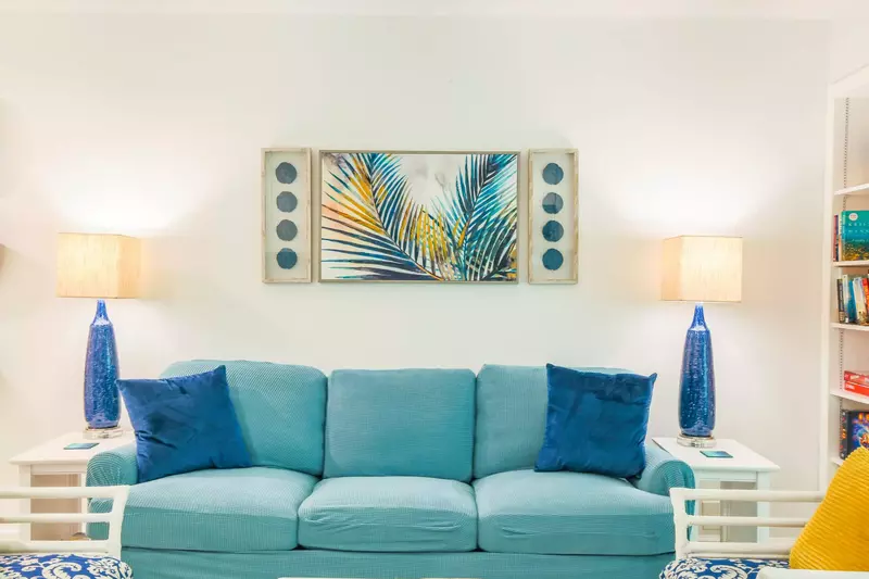 This seaside villa is decorated in a mix of fun blues, teals and ambers.