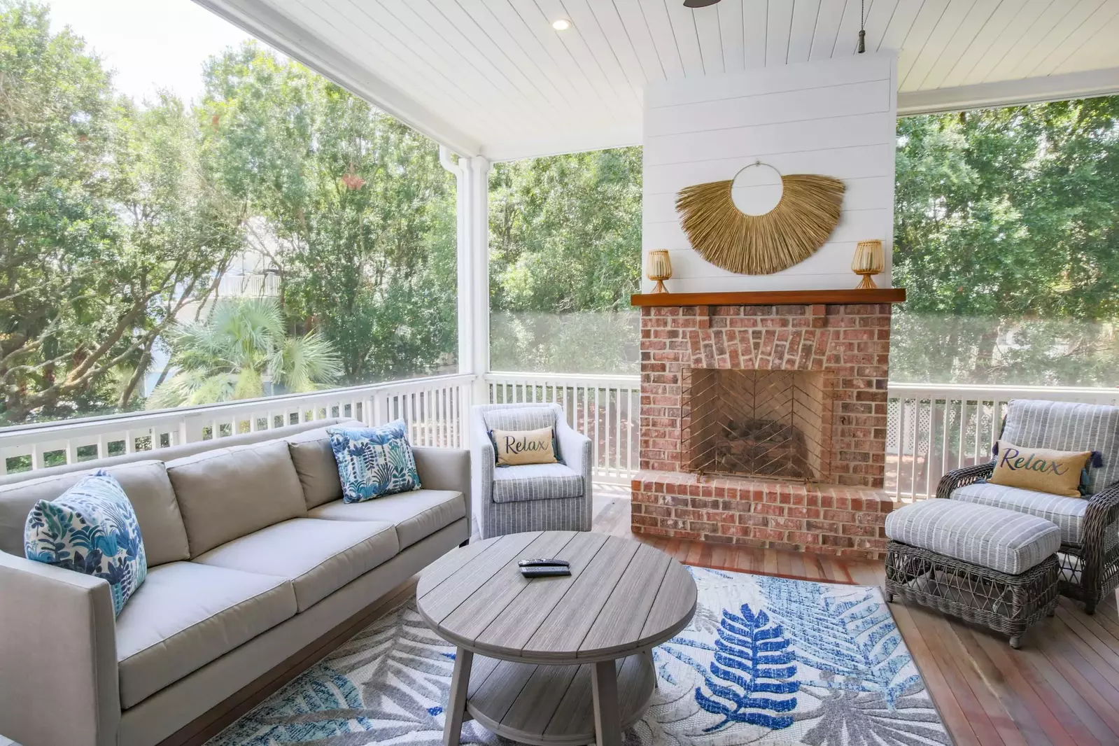 Relax on our inviting & comfortable screened porch with views of the surrounding oak trees and private pool below.
