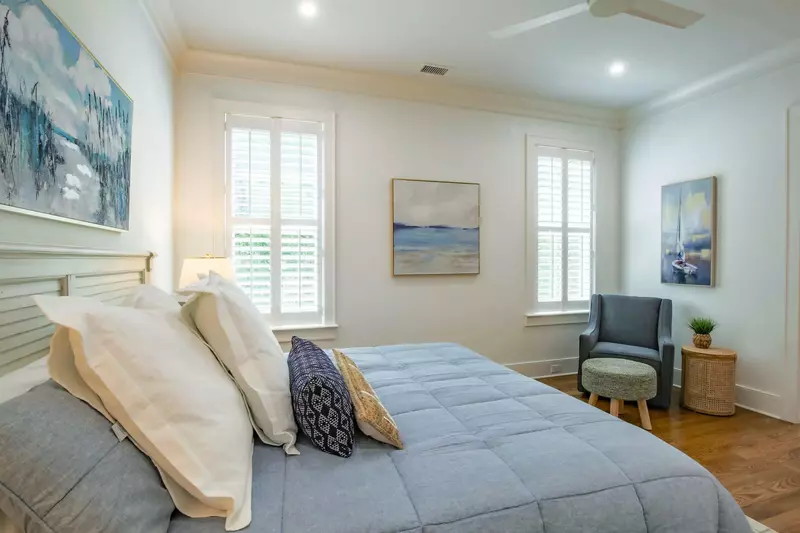 You'll swoon over the coastal blues, beiges and creamy tones that adorn this professionally decorated home.