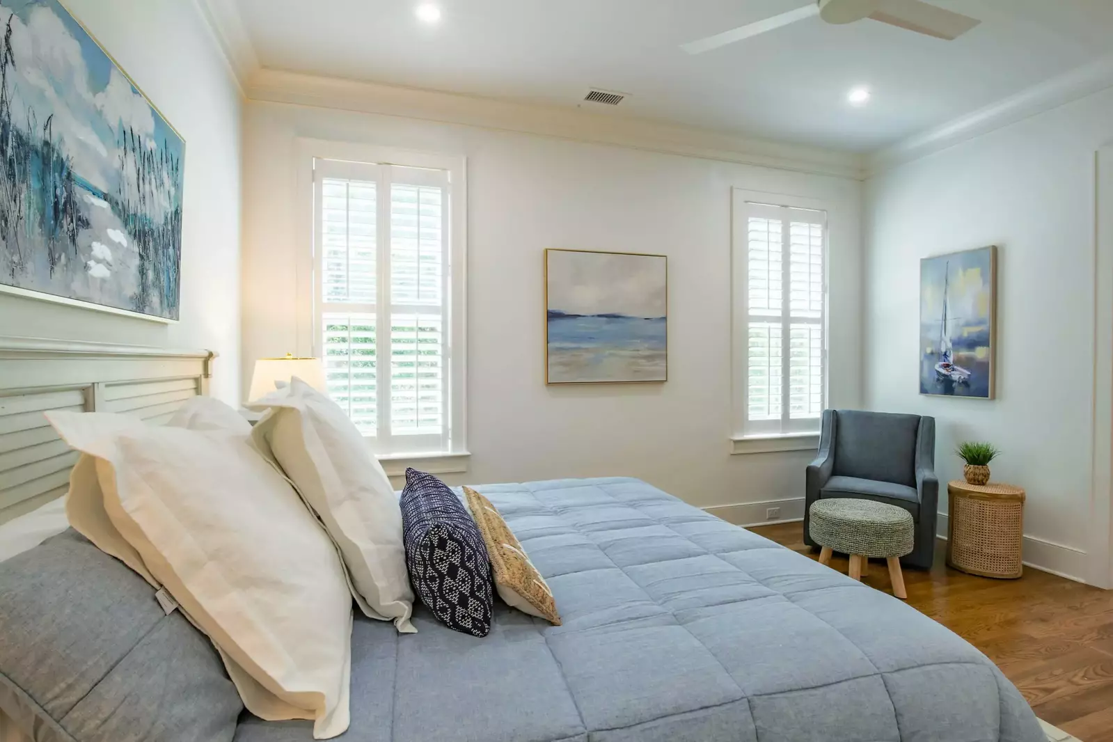 You'll swoon over the coastal blues, beiges and creamy tones that adorn this professionally decorated home.