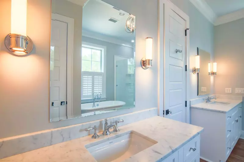 This beautiful home features designer light fixtures, custom cabinetry and many other stunning finishes.