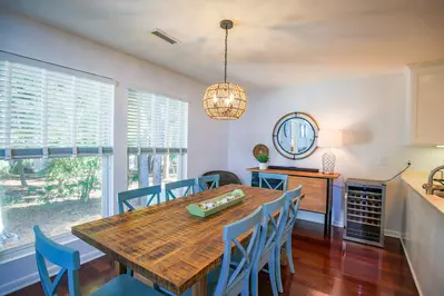 The dining table seats 6.