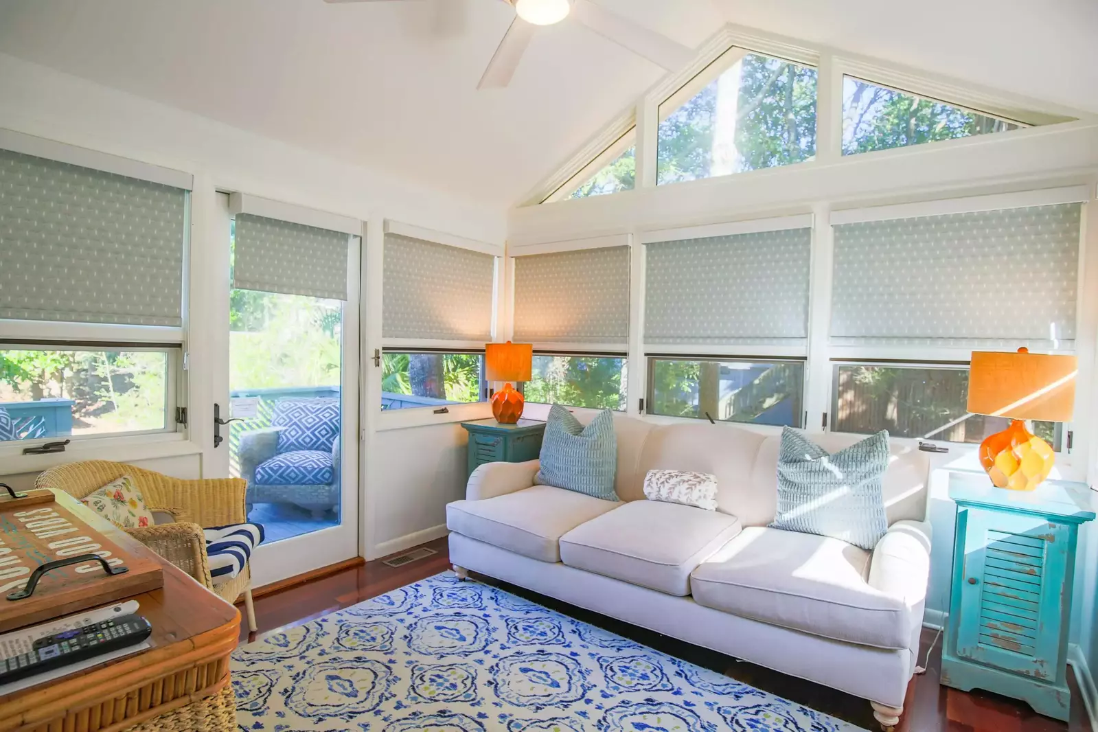 This cozy sunroom is located off of the living room.