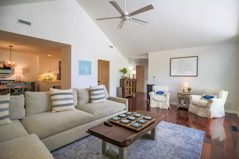 All of the home's bedrooms are located down the hallway from the living room.