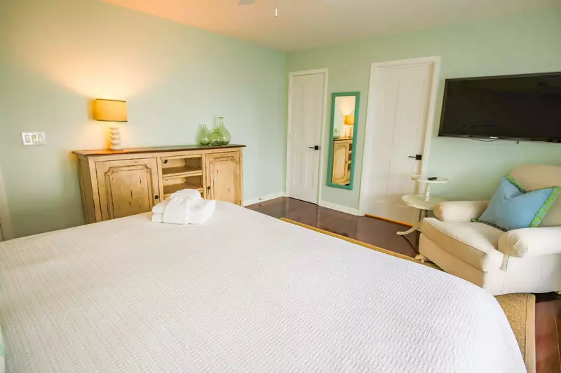 There is also a dresser and en suite bathroom in the master bedroom.