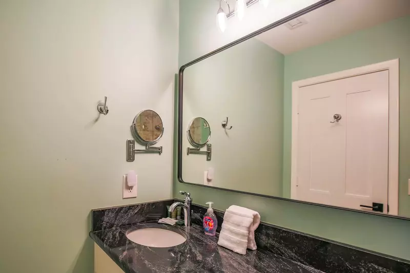 The master suite features a spacious vanity.