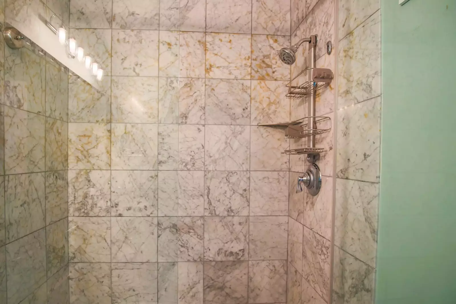 There is also a tiled, walk-in shower in the master bathroom.