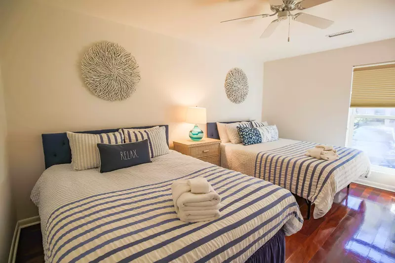 The room looks out onto the front of the home.