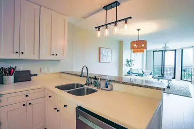 There is an open floor plan layout between the kitchen, dining area and living room.