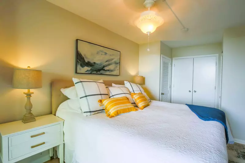 The en suite bathroom for the master bedroom is accessible through these double doors.