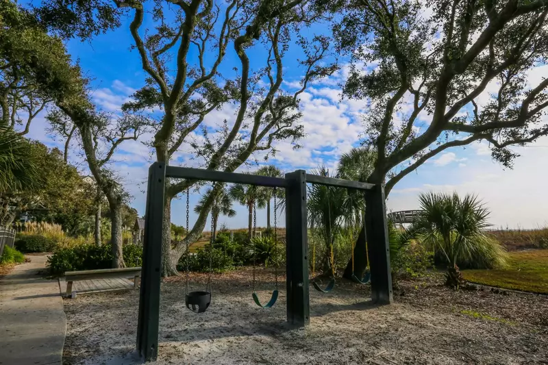 This swingset is located near the Shipwatch community pool.
