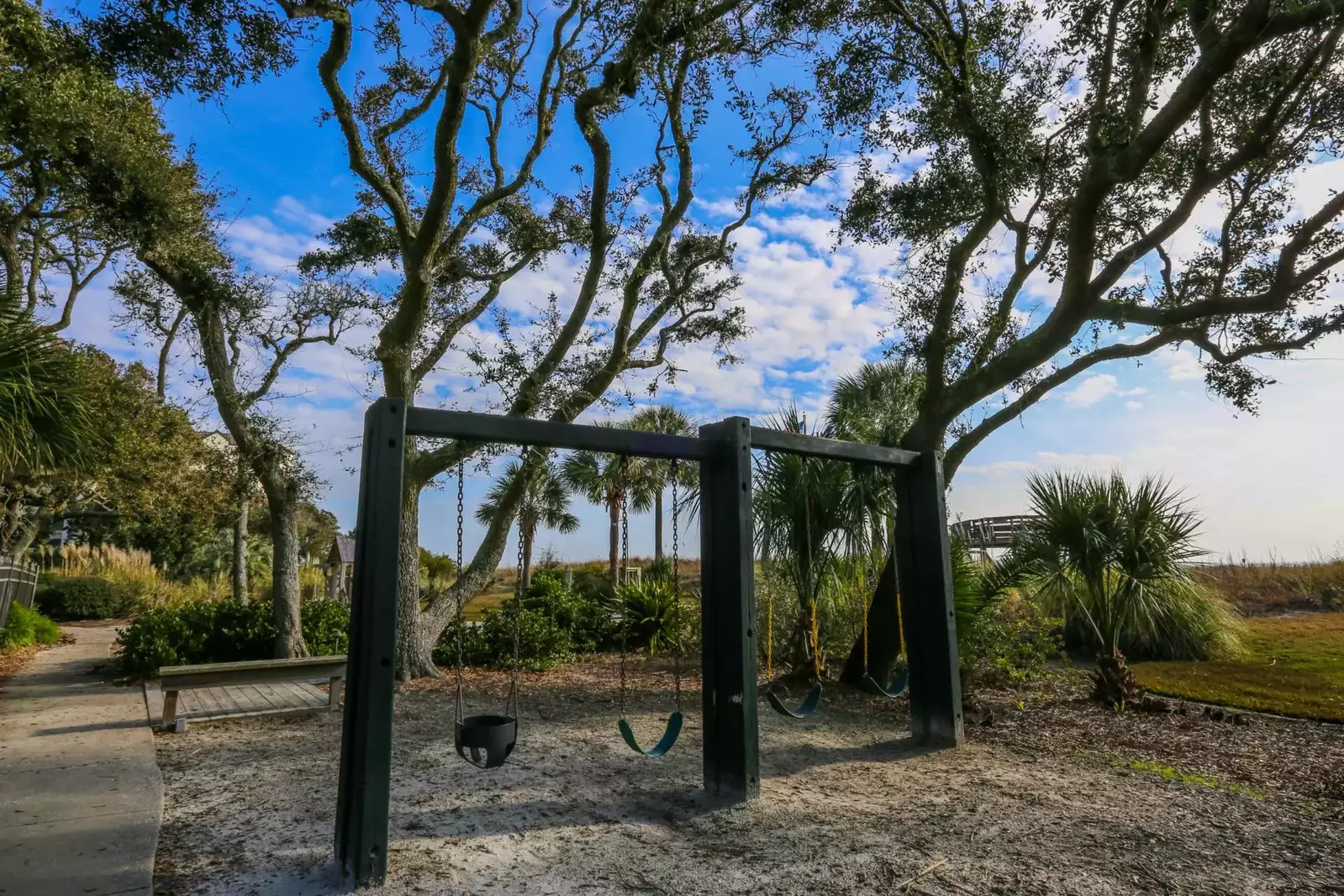 This swingset is located near the Shipwatch community pool.