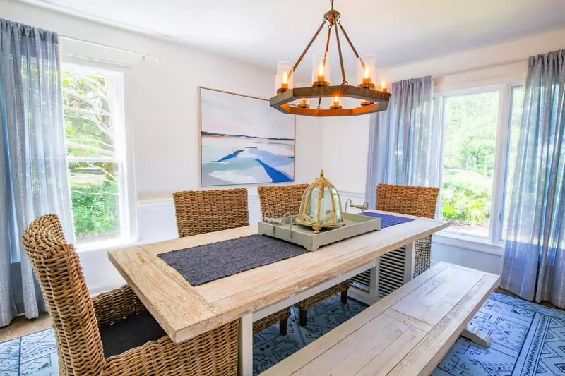 The dining table comfortably seats 6.