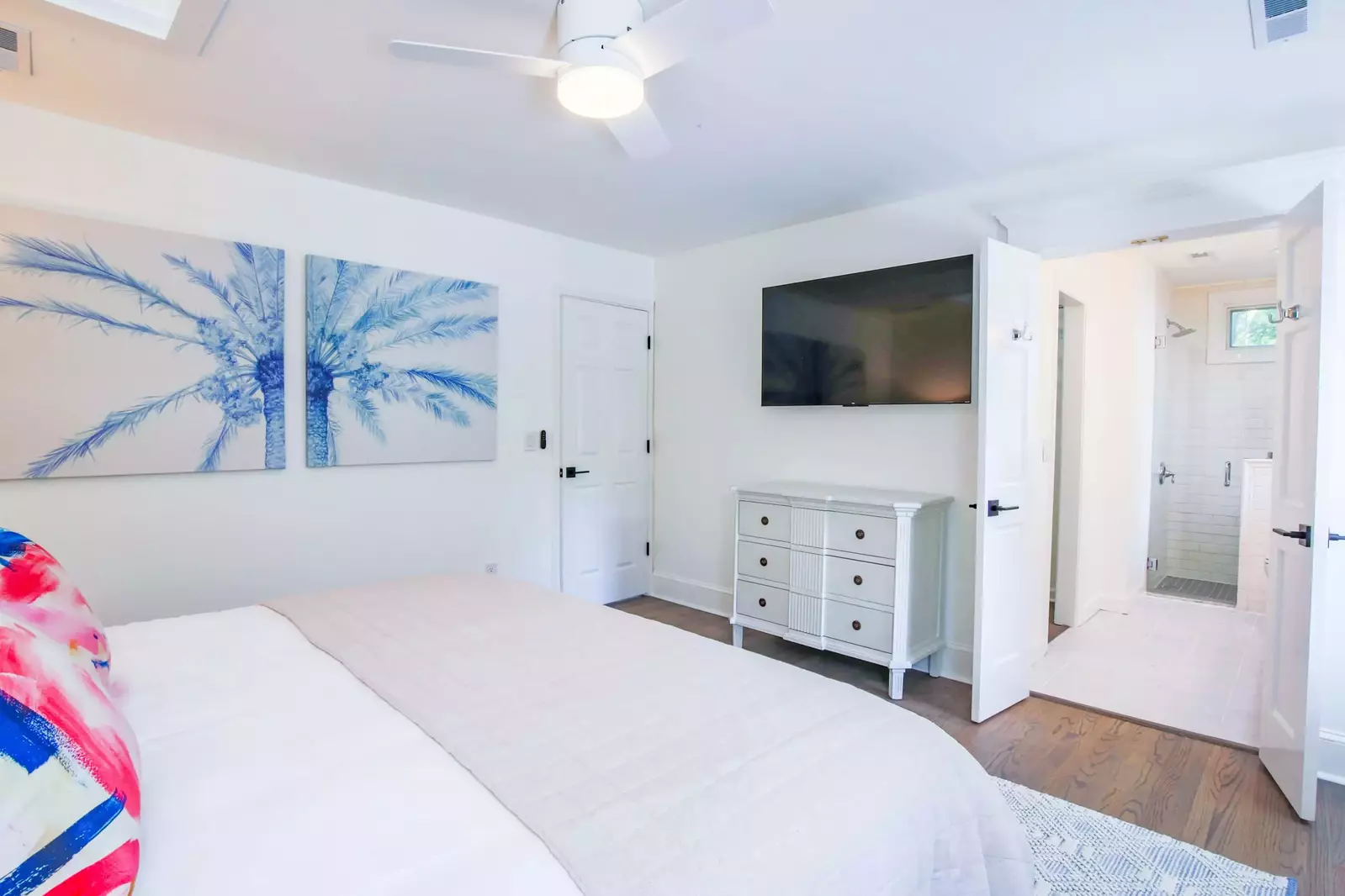 The en suite bathroom is located through these double doors.