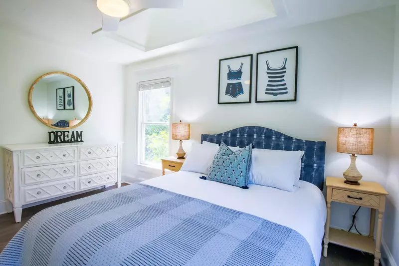 This guest bedroom also has a dresser.