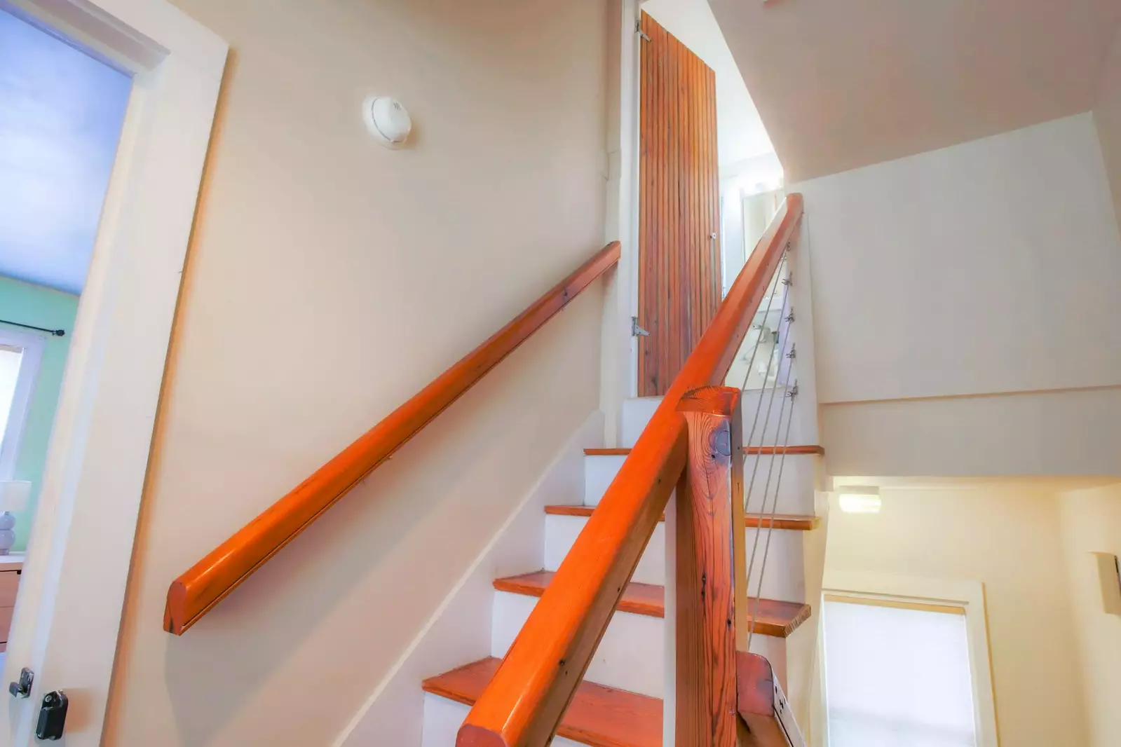 Follow this staircase to the home's second bathroom.