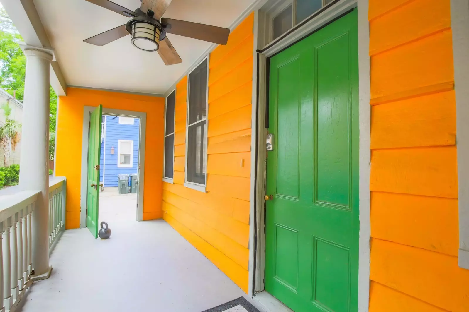 You'll enter the first floor porch to find the home's front door.
