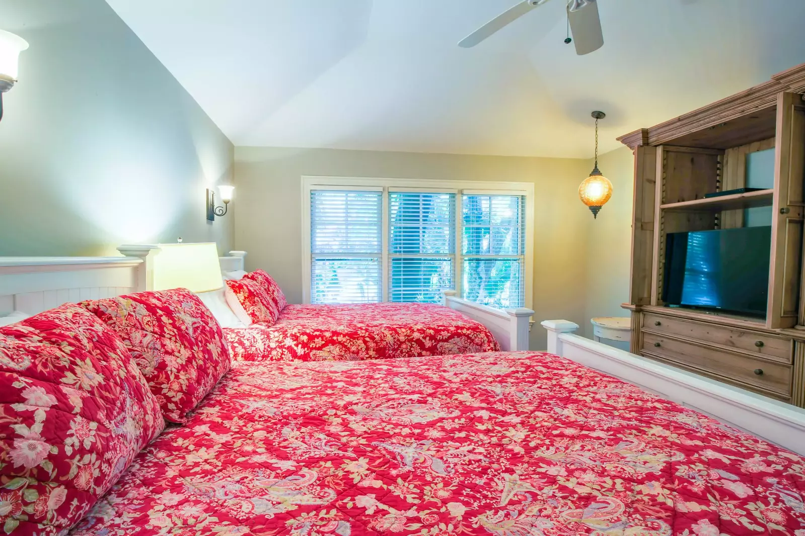 This room also has an armoire with a streaming smart TV.