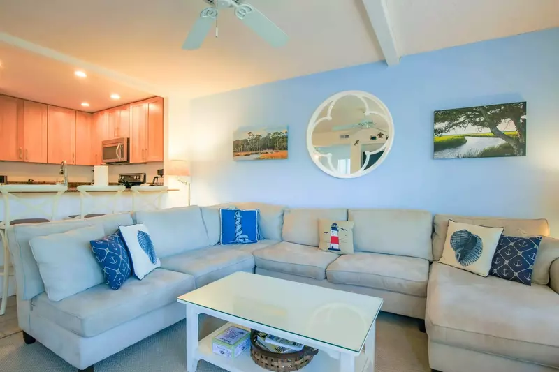 The open floor plan layout makes it very easy to interact with your guests in the living room, kitchen and dining area.