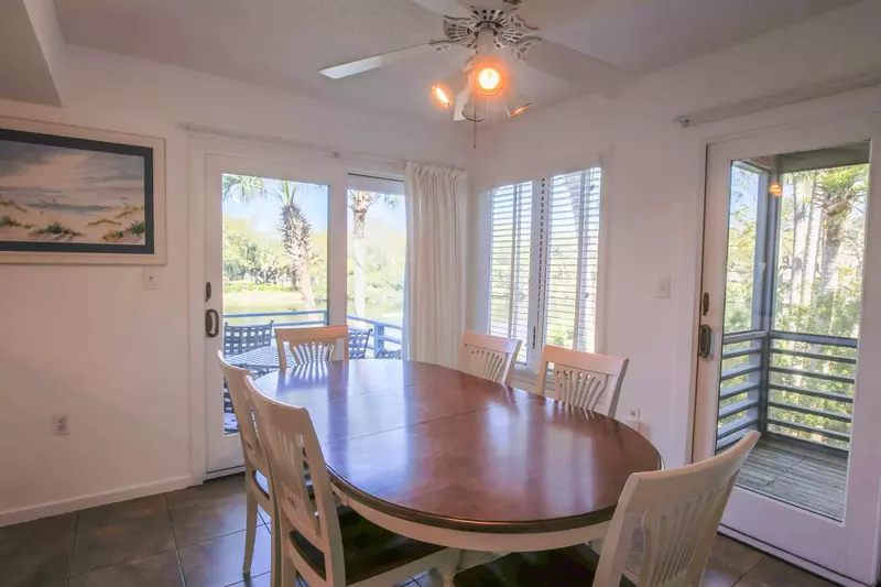 The dining table comfortably seats 6.