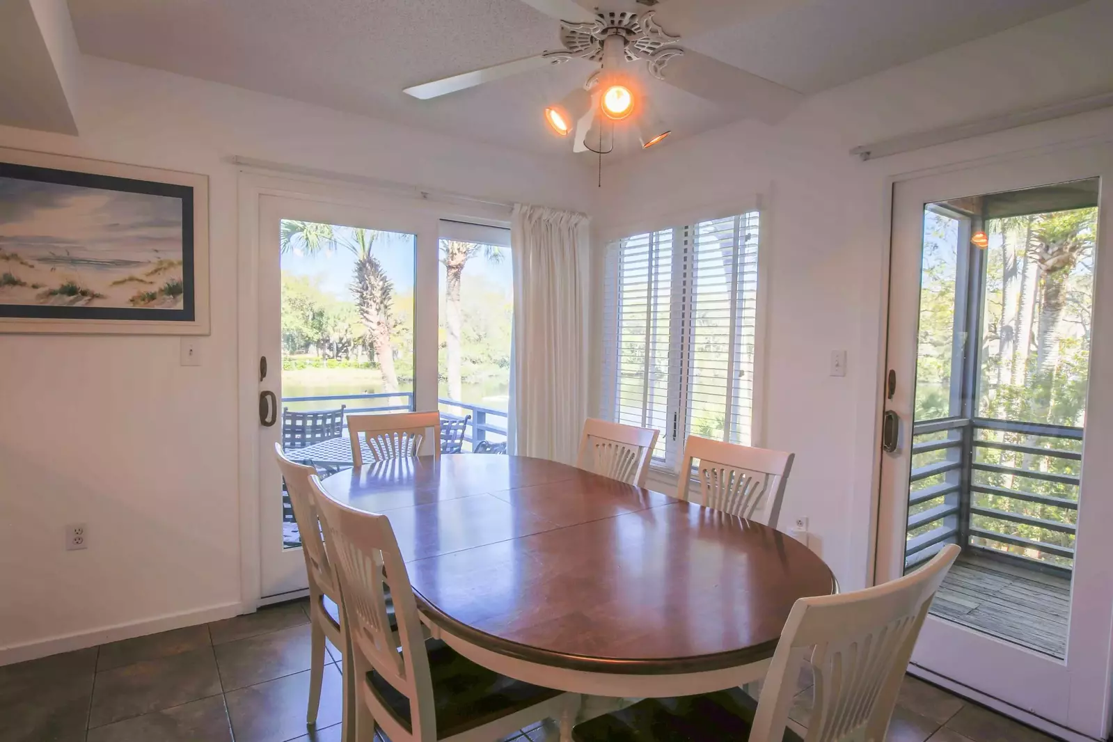 The dining table comfortably seats 6.