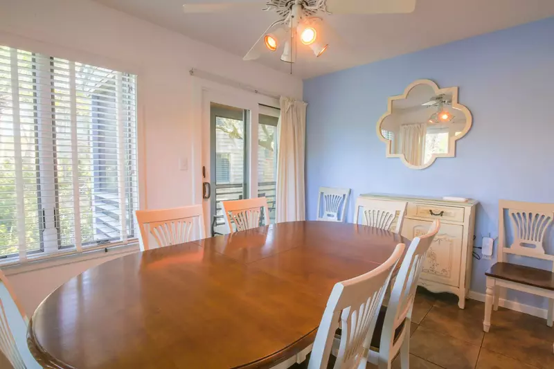 You can access the screened porch and the back deck from the dining room.
