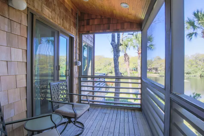Both the screened porch and the back deck feature fabulous views of the lagoon.