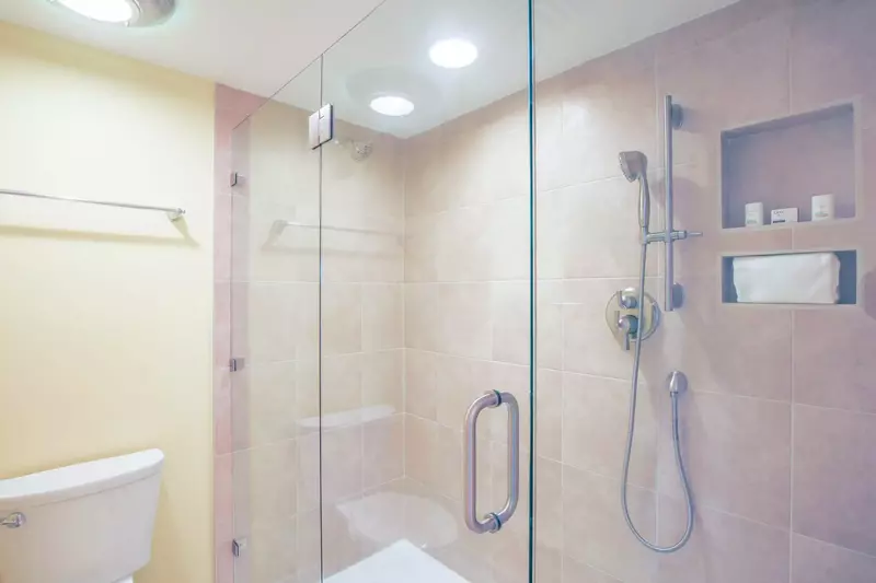 The master bathroom also features this newly renovated, walk-in shower.
