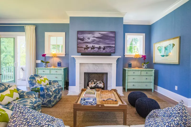 The home is decorated with a happy, coastal color palette of blues, greens and whites.