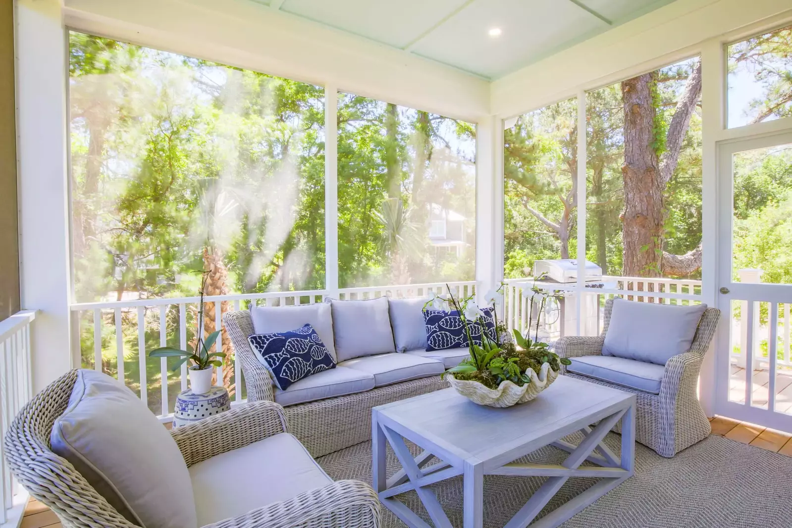 Sit back on the screened porch and relax.