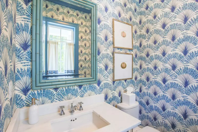 This half bathroom is located on the first floor near the living room and front door.
